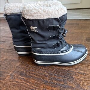 Sorel Kids Waterproof Black Boots with Cream Fleece Lining